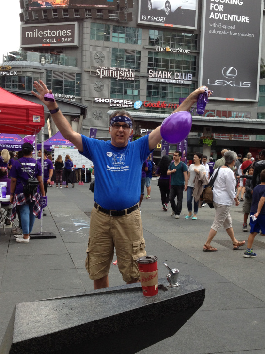 Rob promoting epilepsy awareness at Yonge-Dundas square