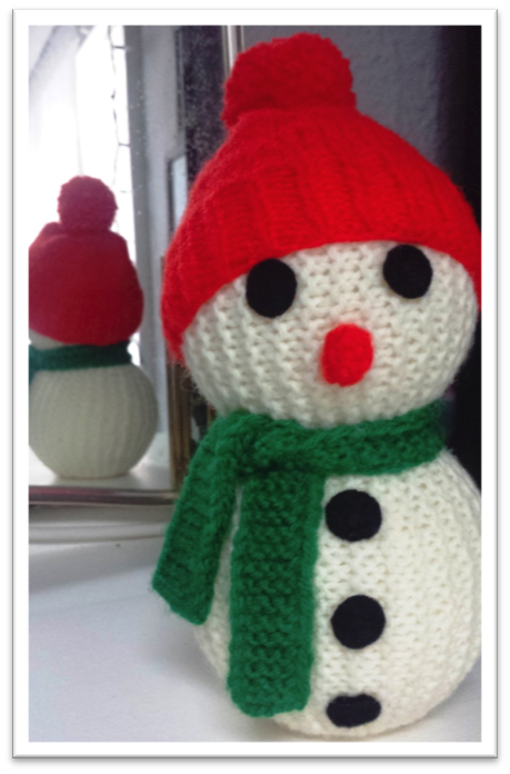 Picture of a small knitted snowperson