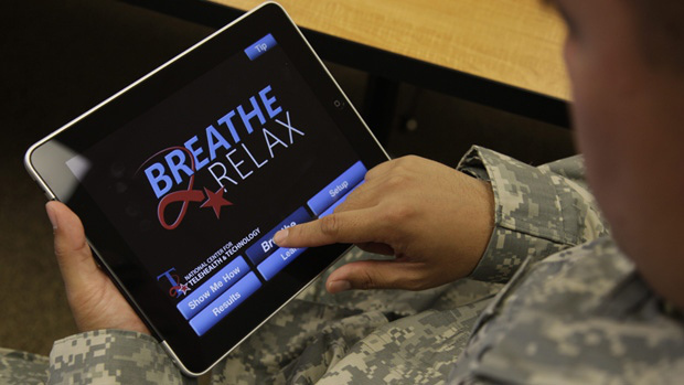 veteran using iPad app to relax