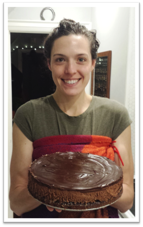 The author Julia holding her chocolate mousse cake